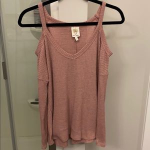 Sweater with cut out shoulder sleeves